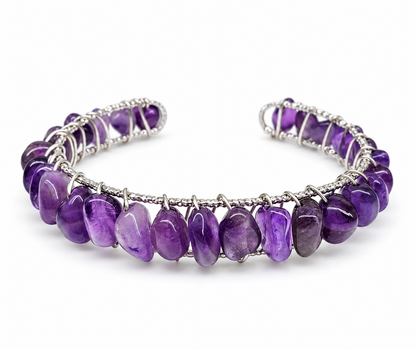 Natural purple amethyst gemstone cuff bracelet with 18K yellow gold overlay and decorative wire-wrapped design.