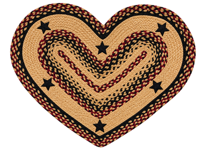 Blackberry Star braided heart jute rug styled on a rustic wooden floor in a cozy primitive farmhouse entryway