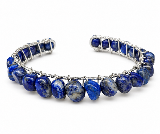 Natural blue Lapis Lazuli gemstone cuff bracelet with 18K white gold overlay wire-wrapped design.