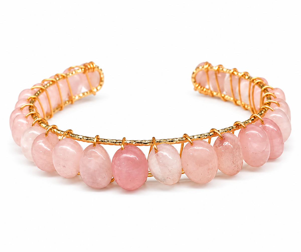 Natural Rose Quartz bangle cuff bracelet featuring soft pink semi-precious gemstones and 18kt gold overlay wire wrapping, handcrafted jewelry from Millee's Boutique.